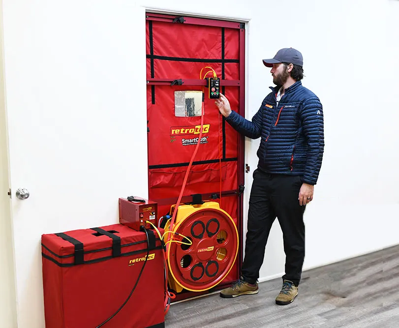 Residential testing fan installed in doorway